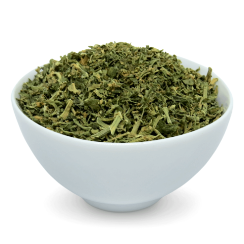 Folhas e caule de kanna desidratados, vistos de frente em uma vasilha branca funda. &Agrave; venda para todo o Brasil na Natureza Divina.