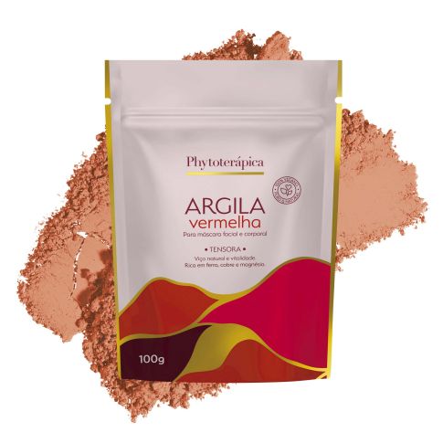 Embalagem de 100g da Argila Vermelha Renovadora da Phytoterápica, apresentada sobre uma pilha da argila em pó de tom avermelhado. O fundo é branco e o rótulo ressalta seu efeito tensor e renovador, sendo rica em óxido de ferro, cobre e silício.